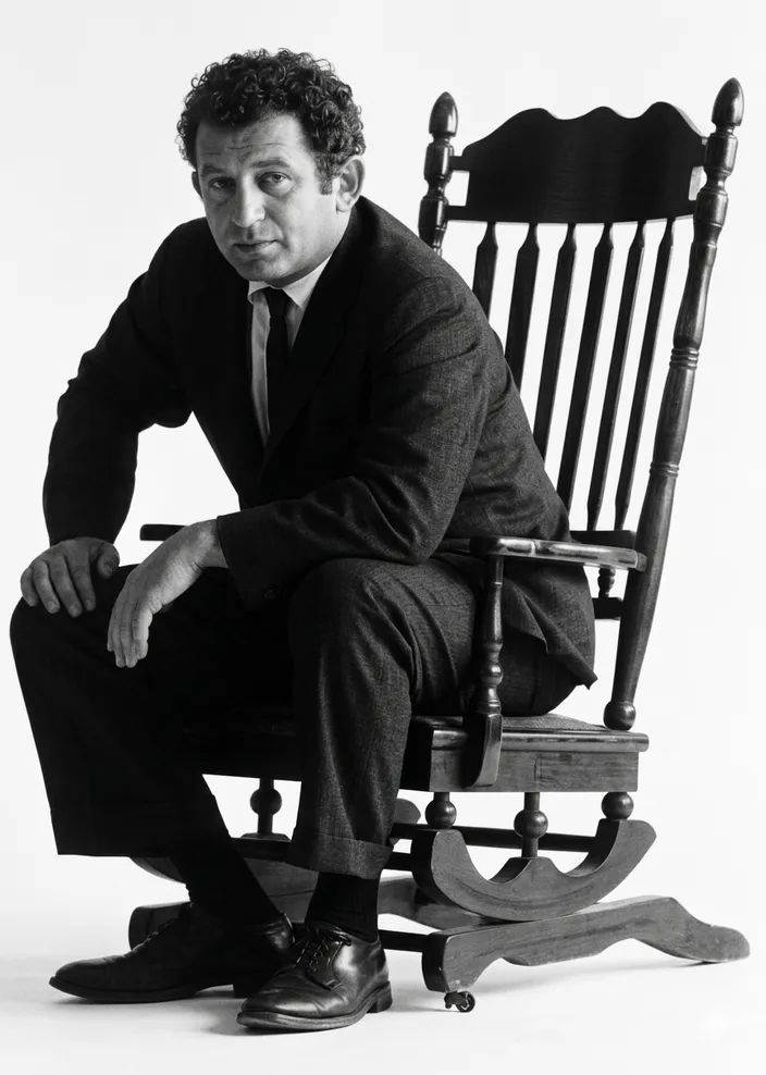 Jacket photograph of The Presidential Papers (Putnam’s, 8 November 1963): Mailer in the JFK-style Boston rocking chair